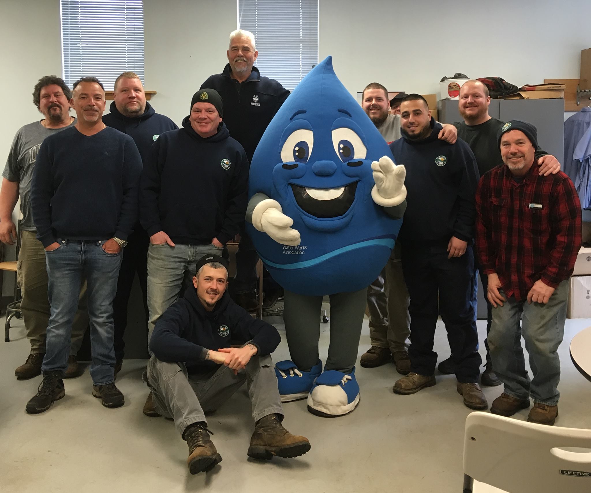 Water Department Employees with Eddy Water Drop
