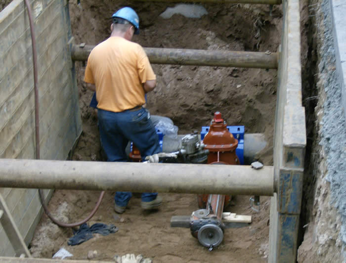 Worker installing at Business Park Drive